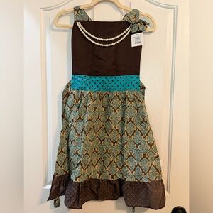 Brown and Teal Patterned Apron with Pearl Necklace